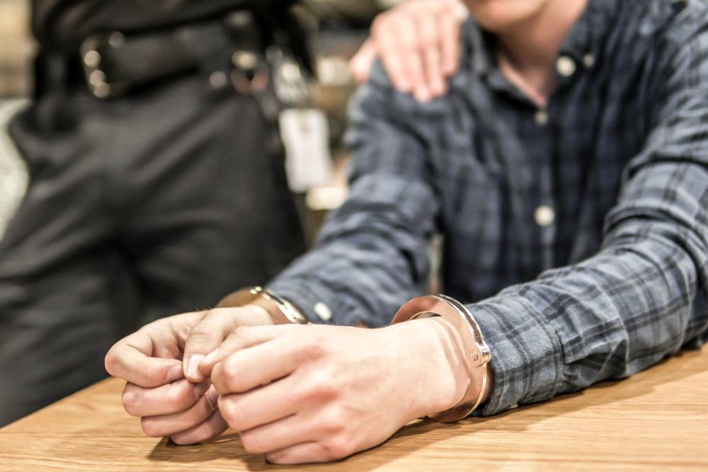 Man arrested by police after commiting a crime