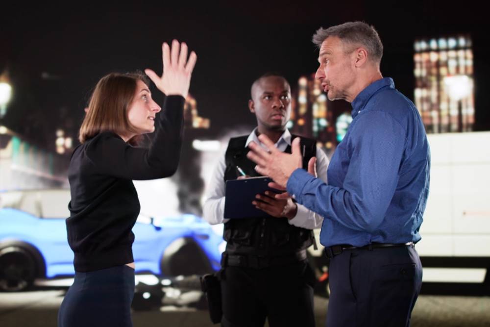 Stressed Driver Argues With Police Officer After Car Accident Claim